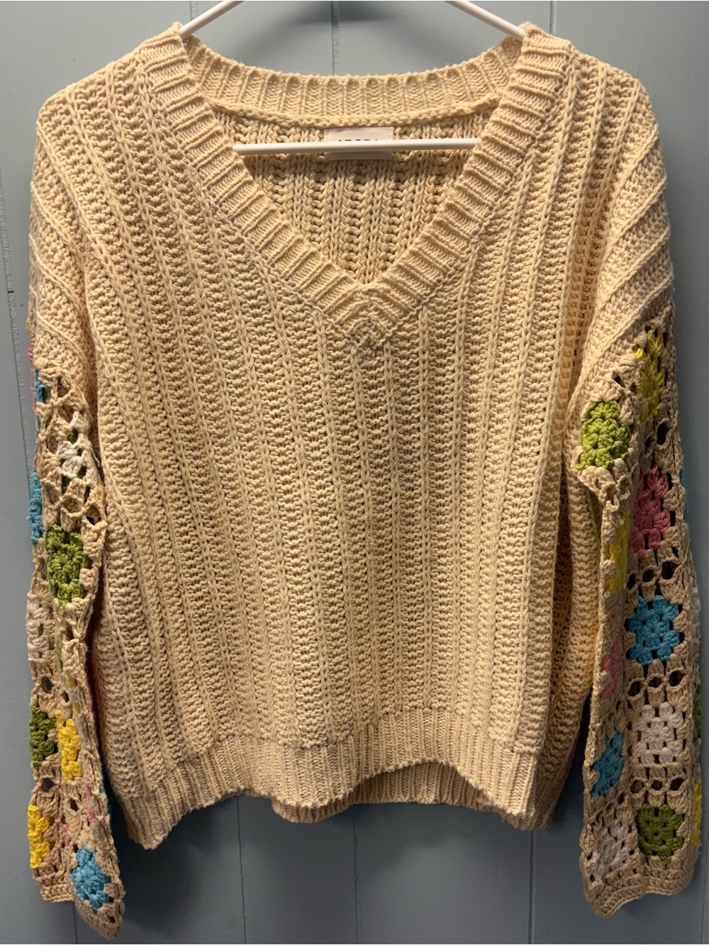 ADORA Cream V-Neck Sweater with Crochet Floral Sleeves